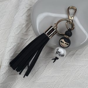 Tashanger popje mom zwarte kwast