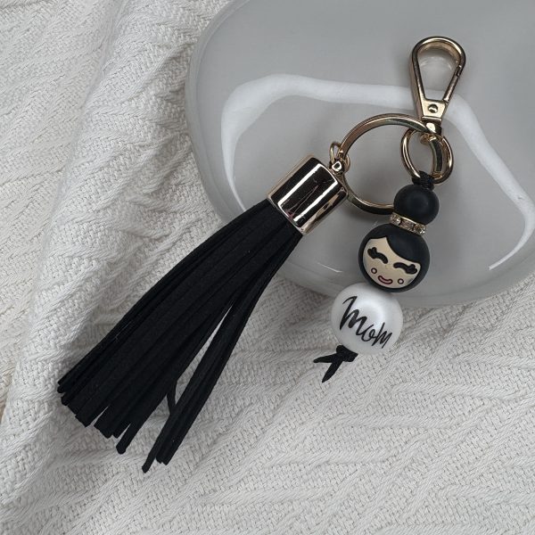 Tashanger popje mom zwarte kwast