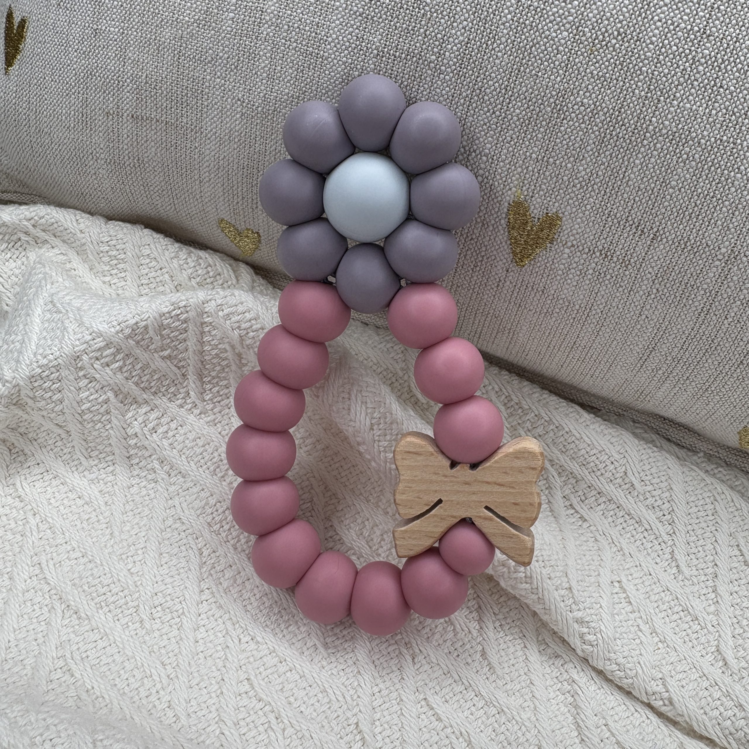 Bijtspeeltje bloem met houten strik