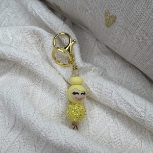 Sleutelhanger feestpopje geel